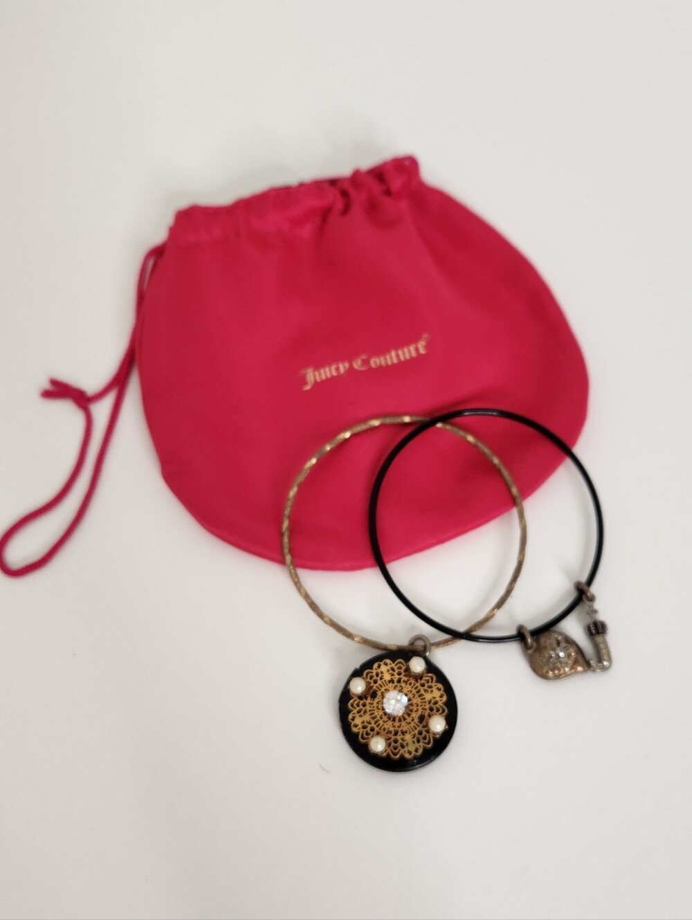 Juicy Couture Hot Pink Pouch with Gold and Black Charm Bangles